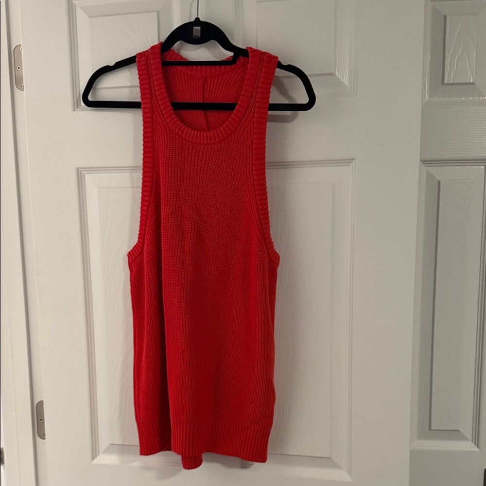 Reddish-Orange Sleeveless Knit Top